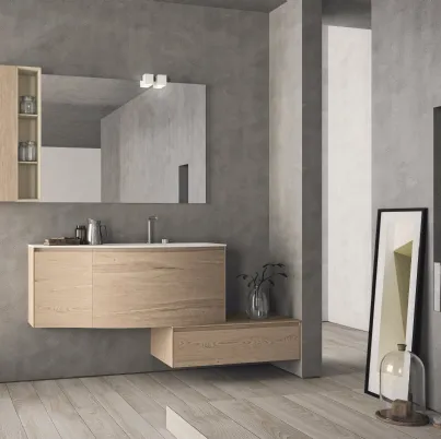 Mobile da Bagno sospeso con frontali curvi in HPL unicolor rovere naturale e lavabo integrato in teknorit bianco opaco Calix XL 05 di Novello