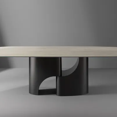 Tavolo Taijitu con piano in marmo e base in metallo di Bonaldo